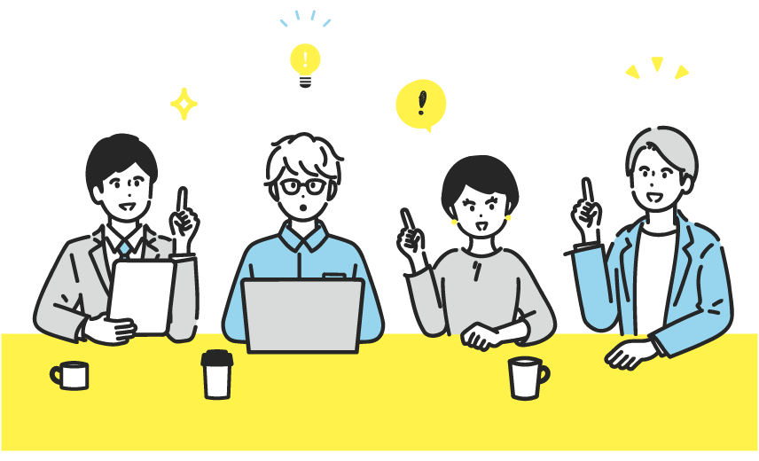 机に座った男女